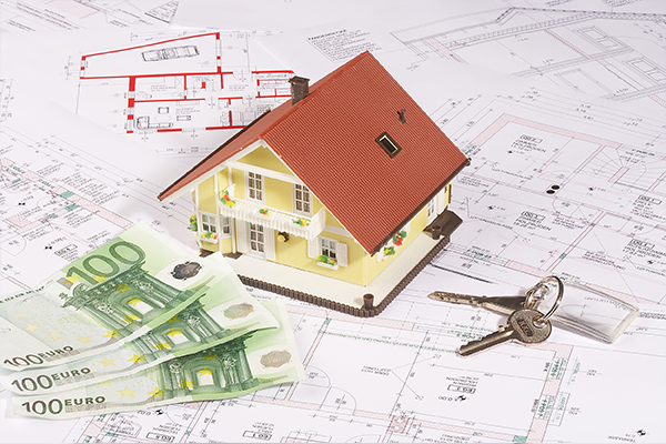 image5 An image of a miniature house sitting on top of a blue print with money around it.